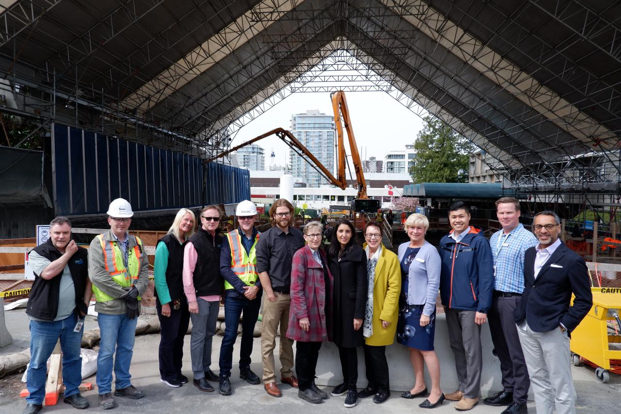 Lions Gate Hospital construction team standing in front of the new LGH power plant