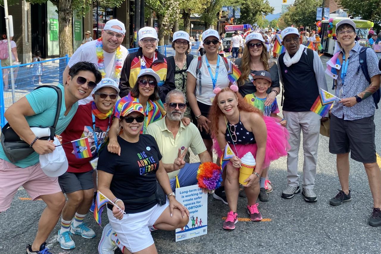 staff posing at Vancouver pride parade 