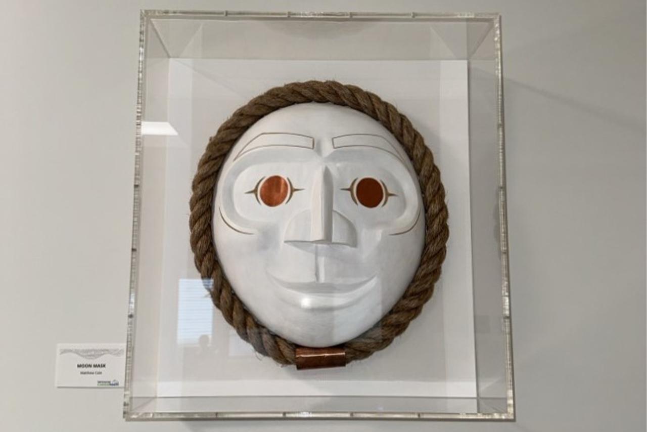 Indigenous carving framed on the wall