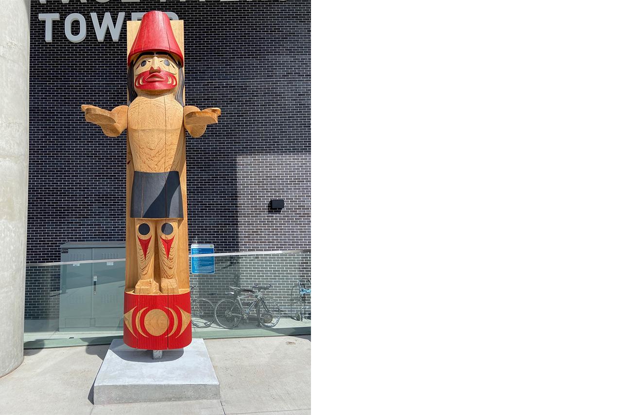 Welcome figure outside Paul Myers Tower hospital building