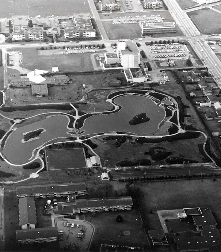 Aerial photograph of Minoru Park, showing lake in centre and Minoru Chapel and Richmond General Hospital in background in 1977