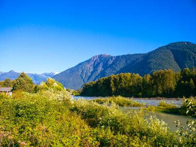 Landscape of Bella Coola with mountains in background.