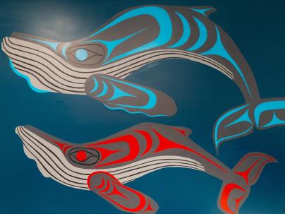 A mural with whales painted at DTES Youth Outreach
