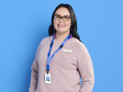 Photo of Amanda, Indigenous Patient Navigator at VCH against a blue background